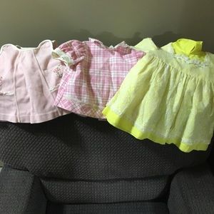 Set of Three Baby Dresses in Pink, Plaid, and Yellow